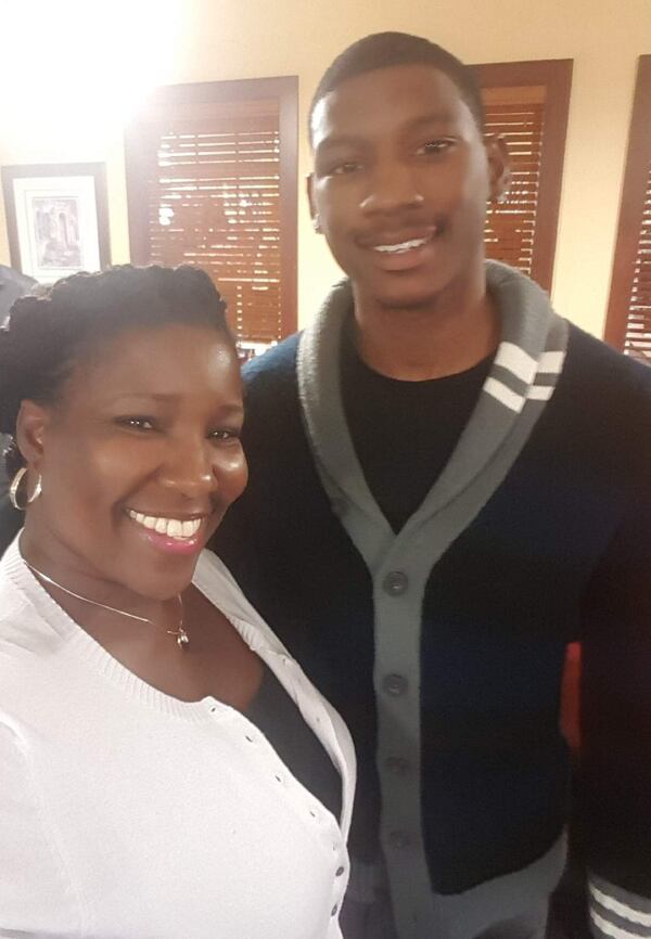 Jacqueline Otey with her 21-year-old son, Todd Dobbs II, the inspiration for her Butter Me Up skin care products. CONTRIBUTED