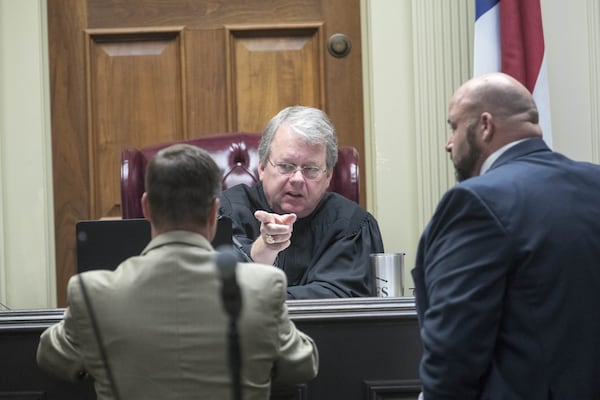 06/22/2018 — Griffin, GA - Spalding County Superior Court Judge W. Fletcher Sams speaks with the Griffin Judicial Circuit District Attorney Ben Coker (left) and defense co-counsel Scott Johnston (right) during the murder trial of Franklin Gebhardt in front at the Spalding County Courthouse ALYSSA POINTER/ALYSSA.POINTER@AJC.COM