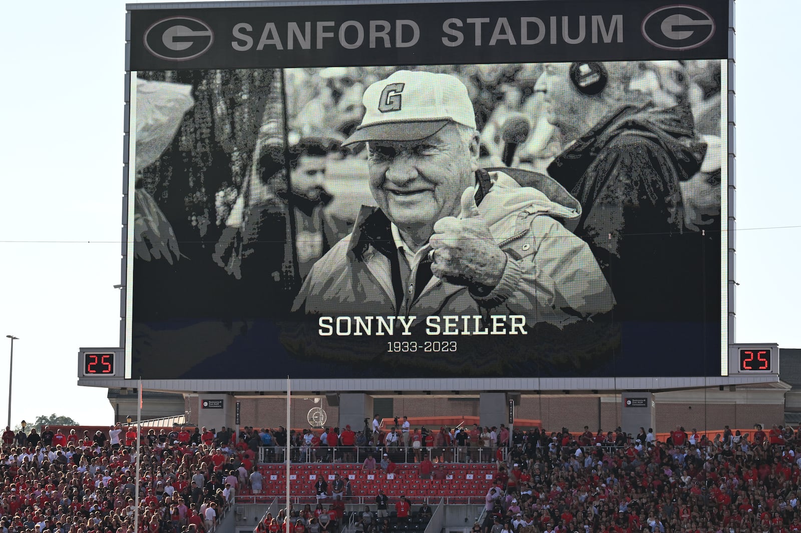 The Jumbotron shows an image of the late Sonny Seiler before Georgia's home opener against UT Martin in an NCAA football game at Sanford Stadium, Saturday, September 2, 2023, in Athens. (Hyosub Shin / Hyosub.Shin@ajc.com)