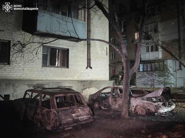 In this image provided by the Ukrainian Emergency Service on Monday, Nov. 11, 2024, damaged cars are seen on a site of a Russian attack on residential area in Mykolaiv, Ukraine. (Ukrainian Emergency Service via AP)