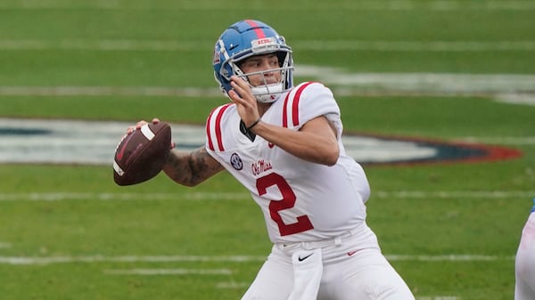 Quarterback Matt Corral (2) drops back to pass during the first half of The Grove Bowl, Ole Miss' spring football game, Saturday, April 24, 2021, in Oxford, Miss. Corrals' Blue team won 28-6. (Rogelio V. Solis/AP)