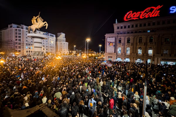 Thousands gather in protest for the victims of a massive nightclub fire in the town of Kocani, in Skopje, North Macedonia, Tuesday, March 18, 2025. (AP Photo/Florent Bajrami)