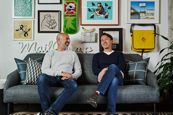 Mailchimp co-founders Dan Kurzius (left) and Ben Chestnut sit in their headquarters office at Ponce City Market in 2021.