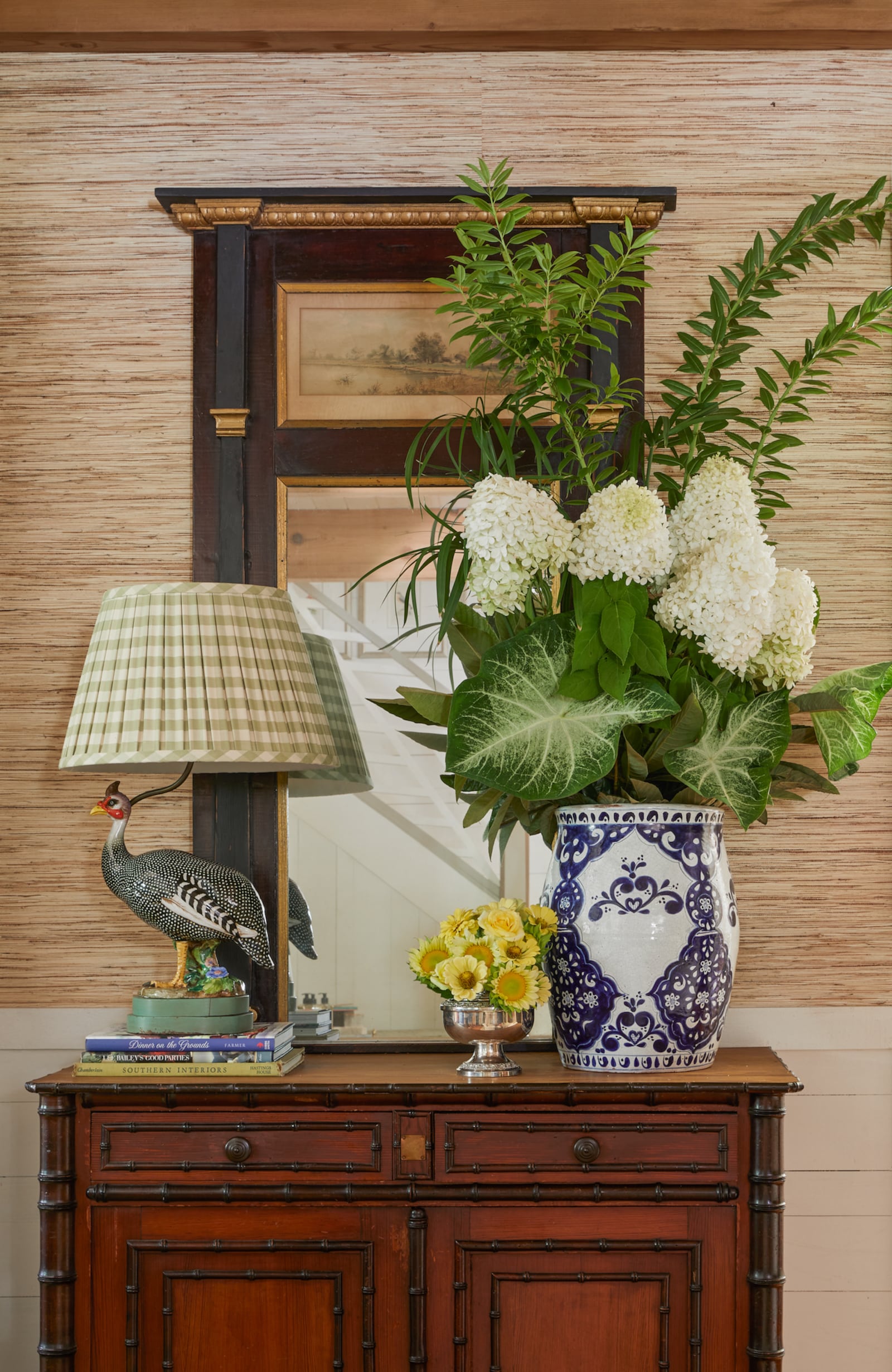 Interior designer James Farmer thinks a key element of Southern style is mixing high and low as in this arrangement of humble sunflowers in a fancy silver cup.
(Courtesy of Emily Followill)