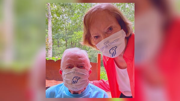 Former President Jimmy Carter and his wife, former First Lady Rosalynn Carter are not attending the funeral of Congressman John Lewis. This photo was released recently by the Carter Center as the Carters encouraged everyone to wear a mask to slow the spread of the coronavirus.