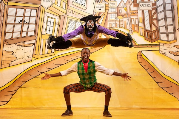 Kat B as Thomas the Cat and Kandaka Moore as Dick Whittington perform during a photocall for Hackney Empire's 25th pantomime in London, Tuesday, Dec. 3, 2024. (AP Photo/Thomas Krych)