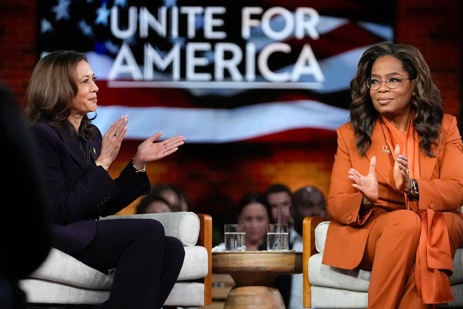 FILE - Democratic presidential nominee Vice President Kamala Harris, left, joins Oprah Winfrey at Oprah's Unite for America Live Streaming event Sept. 19, 2024 in Farmington Hills, Mich. (AP Photo/Paul Sancya, File)