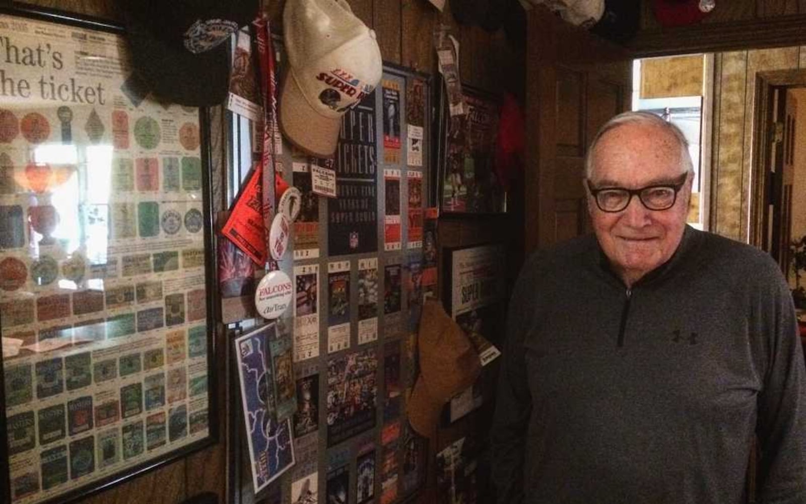 Some of Herb Waterhouse's sports memorabilia. The Johns Creek resident has seen three World Series, three Super Bowls and every Masters since 1953.