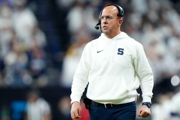 Penn State head coach James Franklin watches from the sideline during the first half of the Big Ten championship NCAA college football game against Oregon, Saturday, Dec. 7, 2024, in Indianapolis. (AP Photo/AJ Mast)