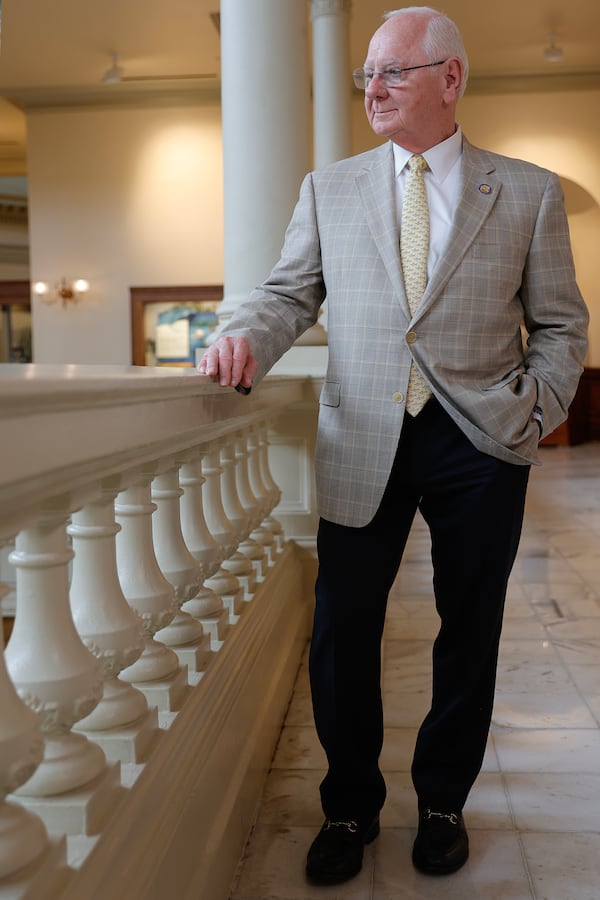 Sen. Rick Williams, R-Milledgeville, makes sure his wife approves of his choice in clothing. But other members of the family also play in the selection. "I have ties with koala bears and foxes and dinosaurs and other animals," he said, "and my grandchildren get a kick out of the different ties.” (Natrice Miller/ natrice.miller@ajc.com)