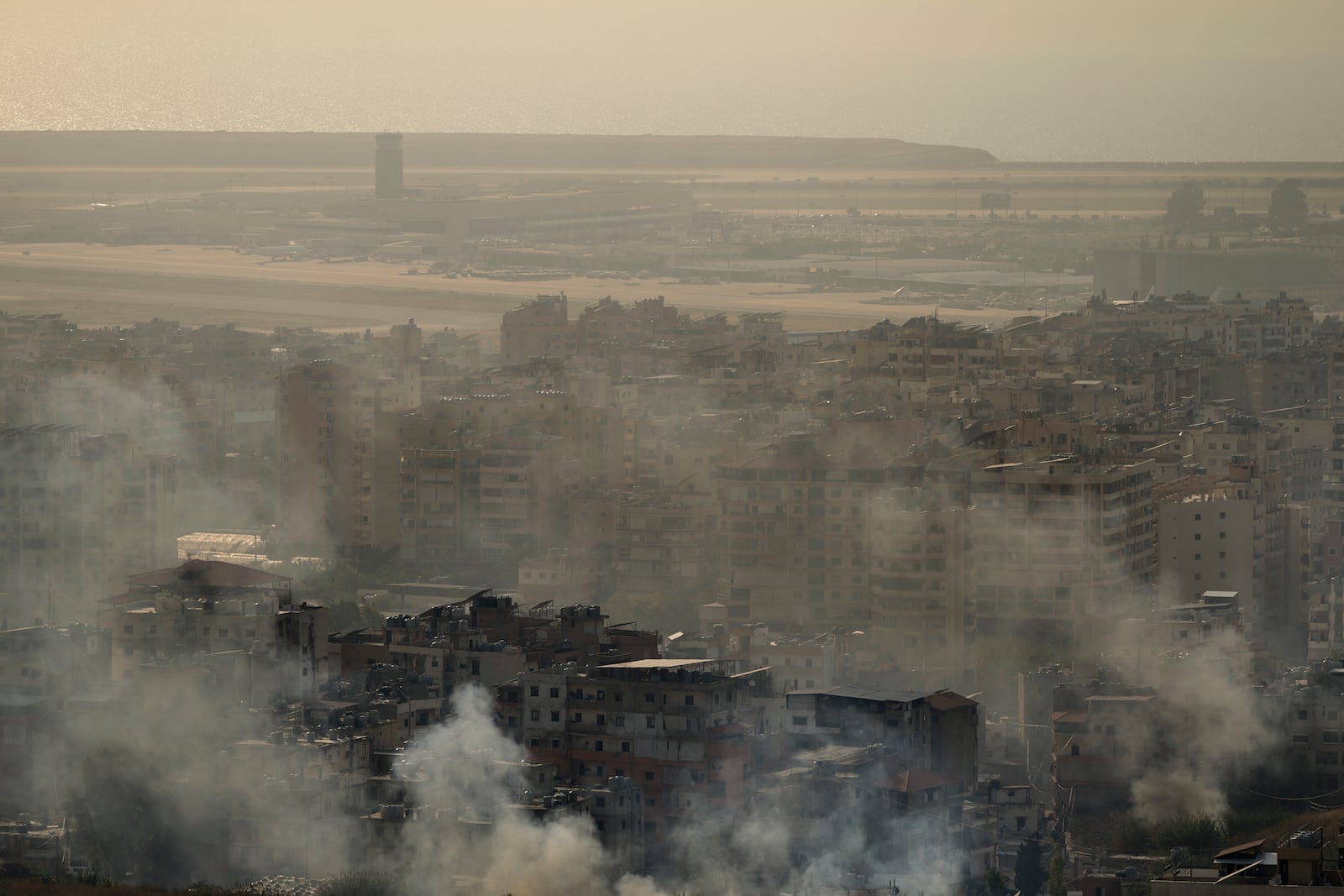 Smoke rises from an Israeli airstrike in Dahiyeh, Beirut, Sunday, Oct. 27, 2024. (AP Photo/Hassan Ammar)