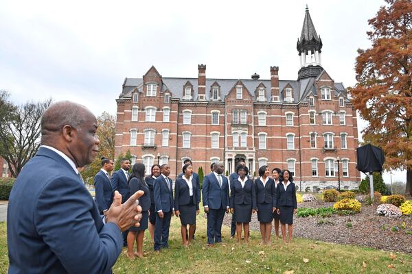 Paul T. Kwami, musical director of the Fisk Jubilee Singers, listens as the Fisk Jubilee Singers sing a song as they were honored with a historic marker on the Fisk University campus. The marker commemorates the Singers and their departure from campus in 1871 to tour the United States and abroad to raise funds for Fisk University.