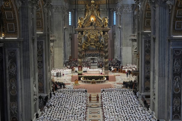 Deacons take part in a mass for their jubilee in St. Peter's Basilica at The Vatican that was supposed to be presided over by Pope Francis who was admitted over a week ago at Rome's Agostino Gemelli Polyclinic and is in critical conditions. (AP Photo/Alessandra Tarantino)