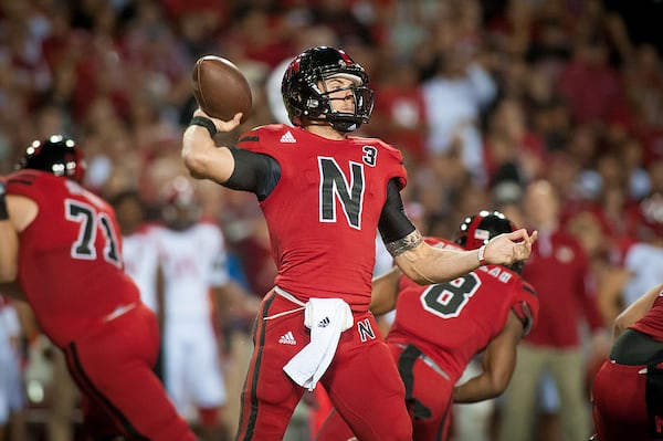 LINCOLN, NE - SEPTEMBER 29: Quarterback Taylor Martinez #3 of the Nebraska Cornhuskers throws against the Wisconsin Badgers defense during their game at Memorial Stadium on September 29, 2012 in Lincoln, Nebraska. Nebraska won 30-27. (Photo by Eric Francis/Getty Images)