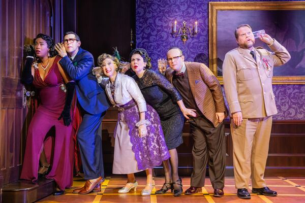 Characters from "Clue: Live on Stage!" try to listen in on a conversation in the next room to figure out why the mansion's proprietor has invited them to a mysterious dinner party.