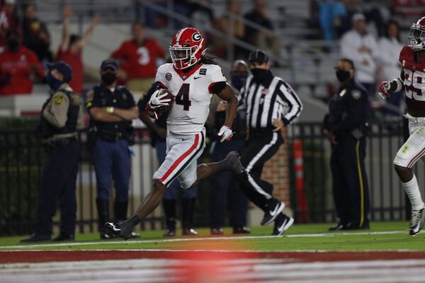 Georgia running back James Cook (4) scores on an 82-yard pass from Stetson Bennett against Alabama Saturday, Oct. 17, 2020, in Tuscaloosa, Ala. Cook added five runs for 16 yards in the 41-24 loss. (Skylar Lien/Alabama Athletics)