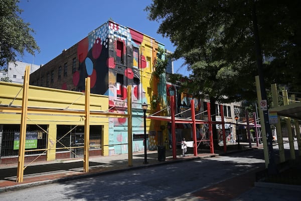 Newport US RE, a German-backed development firm, has recently acquired buildings stretching over several blocks of downtown Atlanta, including these on Broad street. PHOTO / JASON GETZ