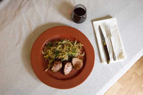 A plate of Char Sui Pork Tenderloin prepared by southern chef, Virginia Willis, is shown in Vinings, Georgia, on Thursday, April 26, 2018. Willis will be releasing her new cookbook, Southern Table: A Food Lover’s Tour of the Global South, on April 30. (REANN HUBER/REANN.HUBER@AJC.COM)