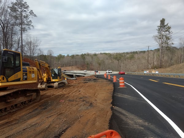 Paving work has finished on Arnold Mill Road on both ends of the Little River Bridge near the Military Depot. This photo shows the bridge from the Fulton County side. (Brian O'Shea / bposhea@ajc.com)