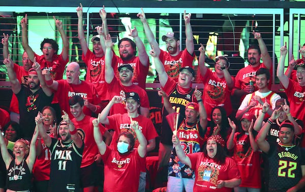 Atlanta Hawks fans cheer their team taking the court to play the Milwaukee Bucks in game 6 of the NBA Eastern Conference Finals on Saturday, July 3, 2021, in Atlanta.   “Curtis Compton / Curtis.Compton@ajc.com”