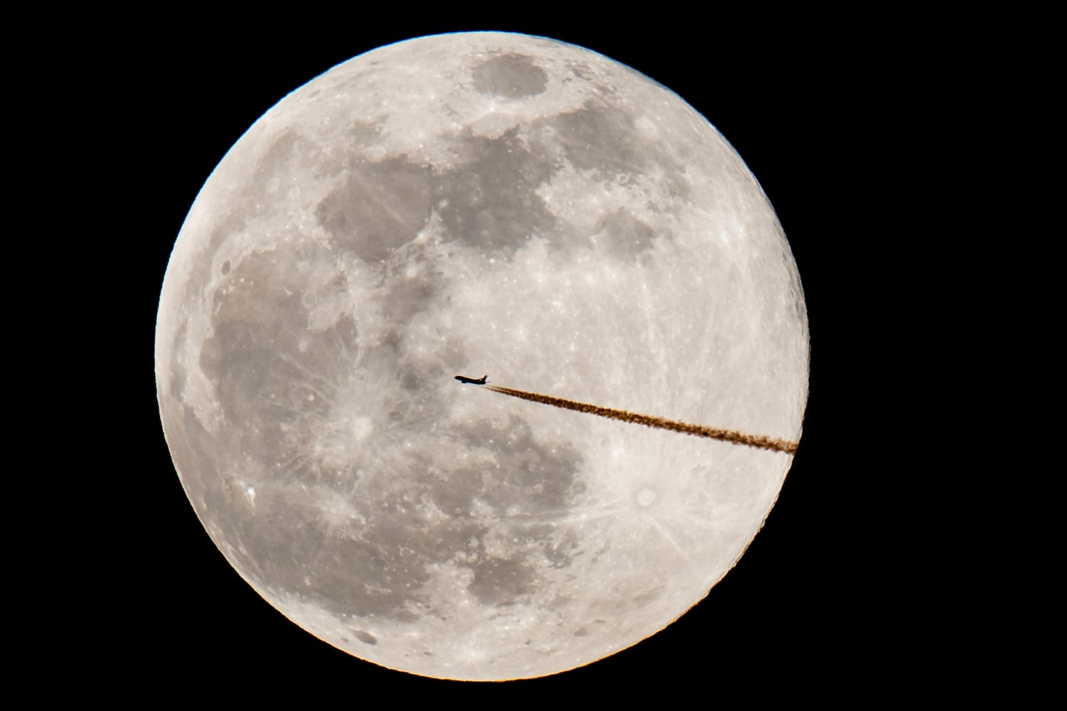 Photos: 'Super snow moon,' largest supermoon of 2019, lights up the sky