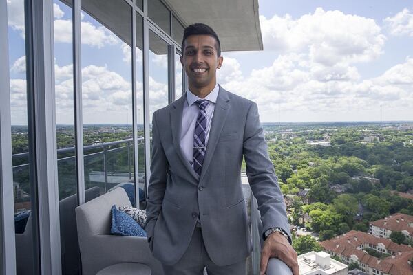 Hasan Pasha, CEO of Pasha Luxury Properties and an agent with Harry Norman, specializes in housing actors, crew and designers working on film and television productions in metro Atlanta. Actors who purchase property in Atlanta view it as an investment, he said. He is pictured in a residential condominium at the Loews Hotel where some actors stay while filming in the area. ALYSSA POINTER / ALYSSA.POINTER@AJC.COM