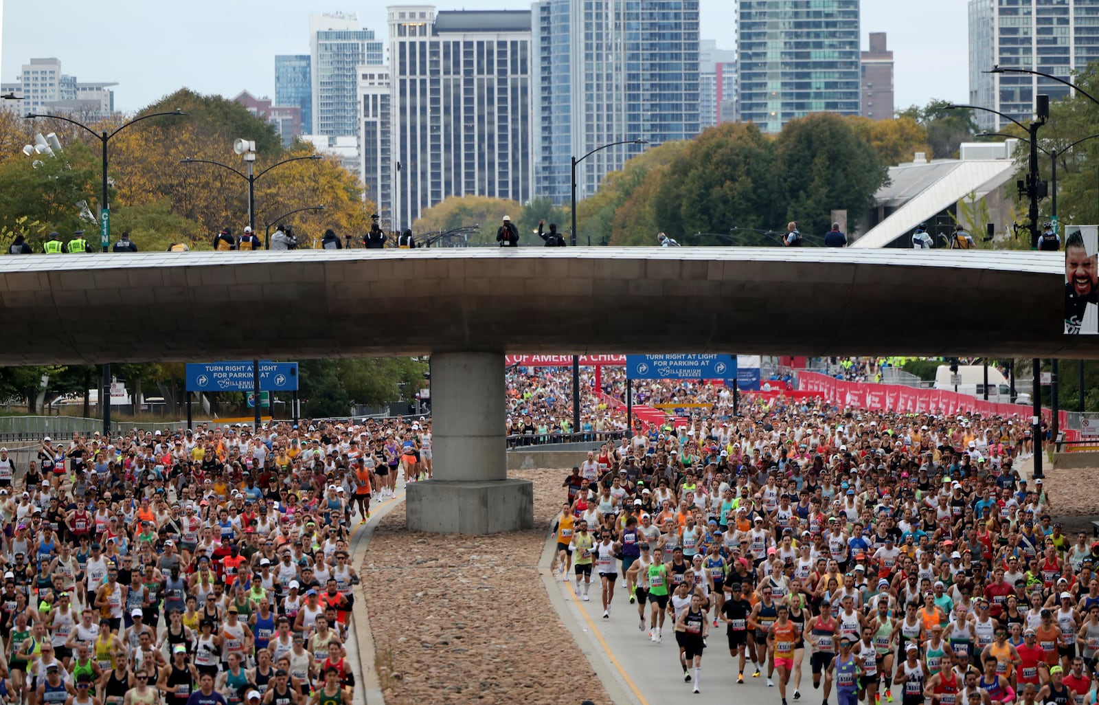 Runners head north on Columbus Avenue in Grant Park to start the Chicago Marathon on Sunday, Oct. 13, 2024. (Tess Crowley/Chicago Tribune via AP)