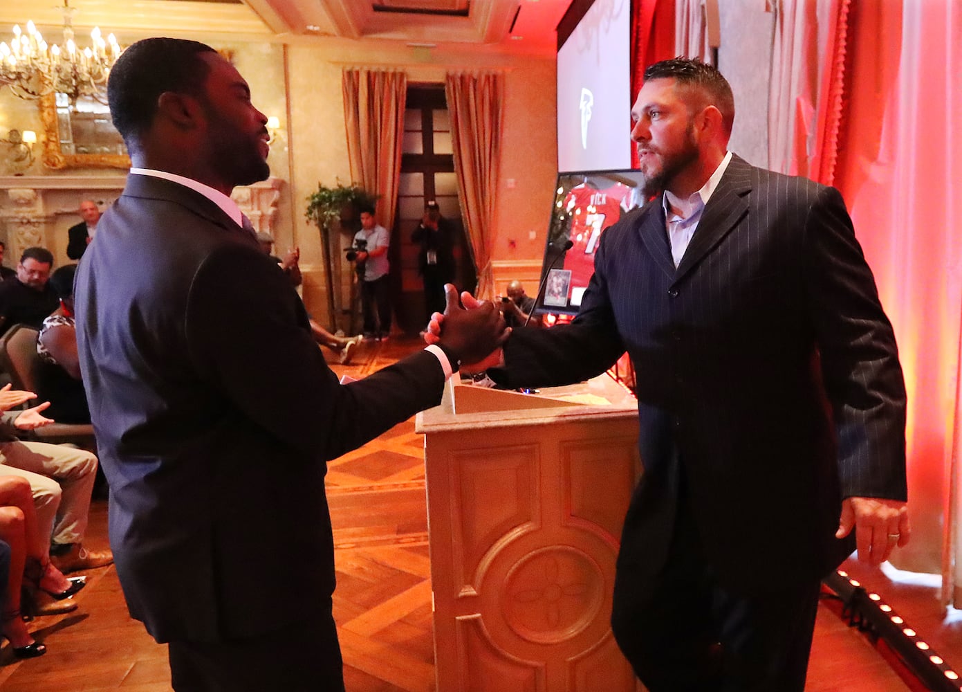 Photos: Falcons honor retirements of Michael Vick, Roddy White