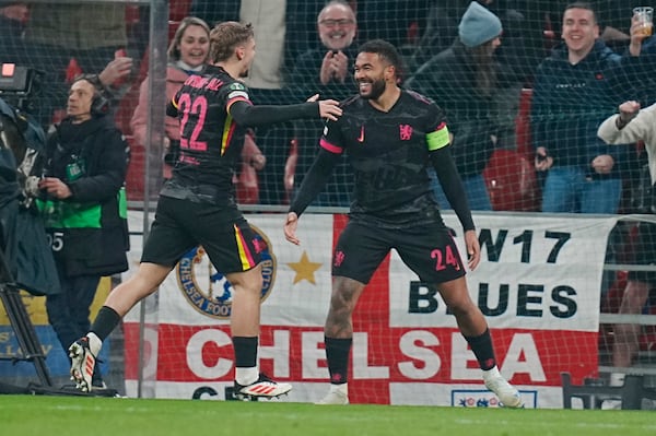 Chelsea's Reese James, right, celebrates scoring during the Conference League round of 16 soccer match between FC Copenhagen and Chelsea FC at Parken Stadium in Copenhagen, Denmark, Thursday March 6, 2025. (Liselotte Sabroe/Ritzau Scanpix via AP)