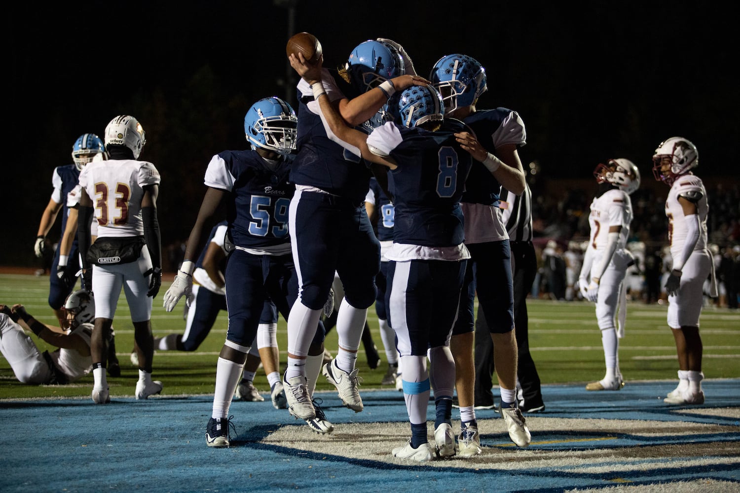 Cambridge players celebrate a touchdown during a GHSA high school football game between Cambridge and South Paulding at Cambridge High School in Milton, GA., on Saturday, November 13, 2021. (Photo/Jenn Finch)