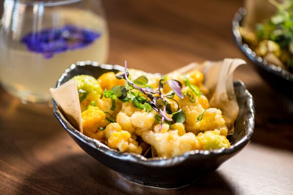 Cauliflower small plate coated with miso chili sauce. Photo credit- Mia Yakel.