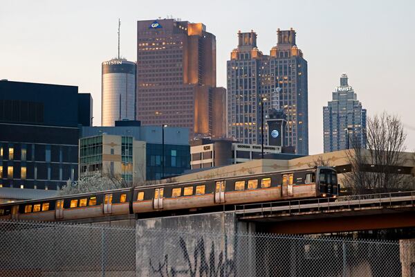 The Atlanta skyline is shown as a MARTA train leaves the Georgia State MARTA Station off of Piedmont Avenue on Monday, March 6, 2023, in Atlanta. Jason Getz / Jason.Getz@ajc.com)
