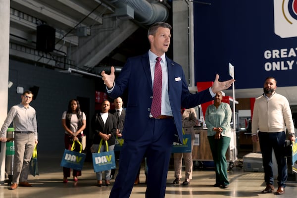 Allen Von Plinsky, director of events at RecruitMilitary, speaks to veterans at a job fair at Mercedes-Benz Stadium, Thursday, September 29, 2022, in Atlanta. Around 300 veterans met with dozens of employers. (Jason Getz / Jason.Getz@ajc.com)