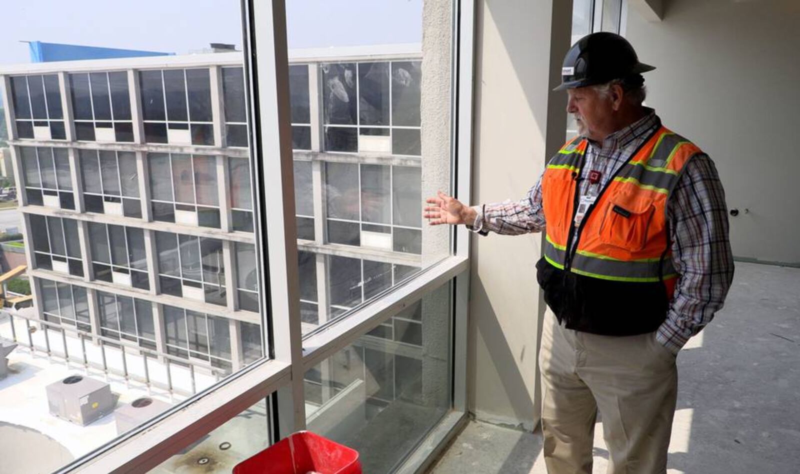 Taine Waller, director of construction at Piedmont Columbus Regional in Columbus, gives a tour of the Bill and Olivia Amos Children’s Hospital that’s under construction in Columbus, Georgia. (Photo Courtesy of Mike Haskey)