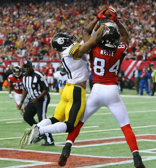 Falcons wide receiver Roddy White sets the franchise record with his 62nd touchdown reception against Steelers cornerback Antwon Blake during the fourth quarter Sunday. CURTIS COMPTON / CCOMPTON@AJC.COM