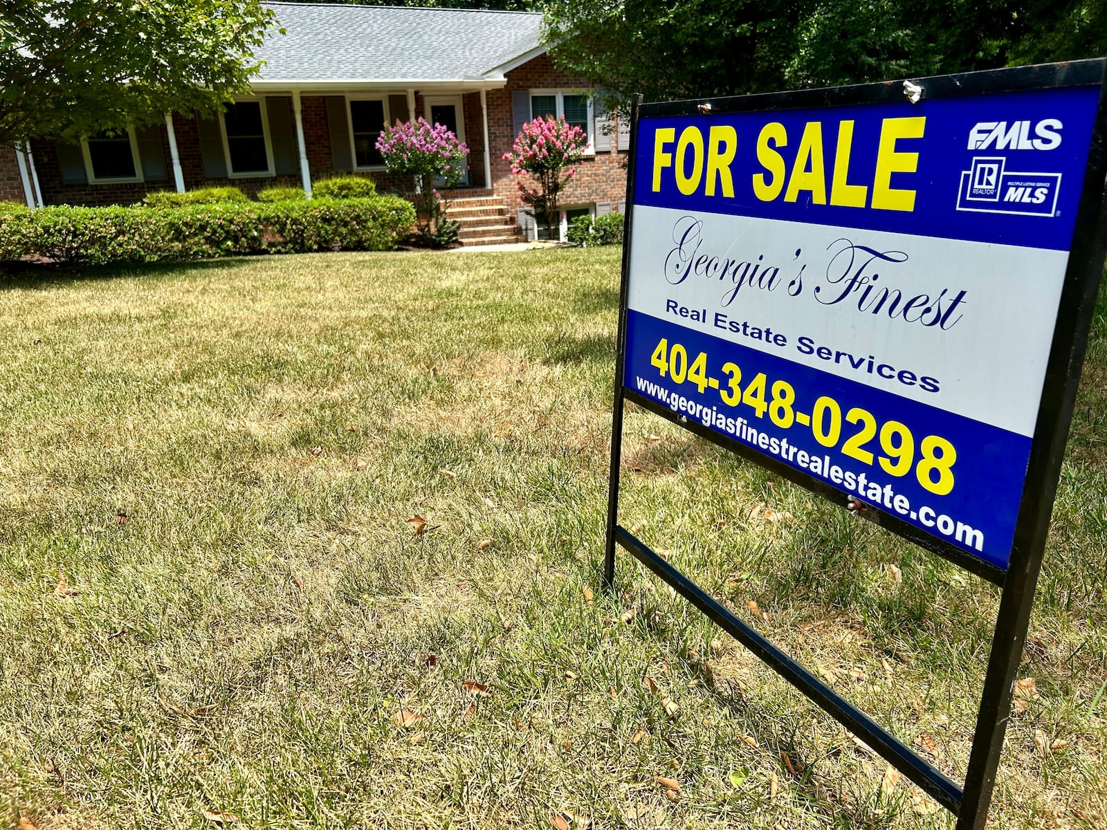 WIth many Atlantans heading for vacations - and interest rates still high - the housing market cooled as summer was arriving. (J. Scott Trubey/AJC)