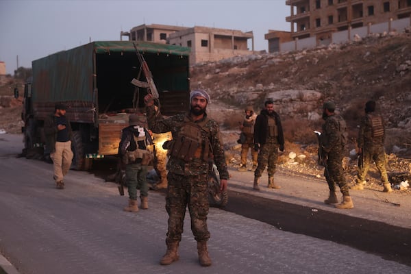 Opposition forces take control of areas outside Aleppo, Syria, Friday, Nov. 29, 2024. (AP Photo/Ghaith Alsayed)