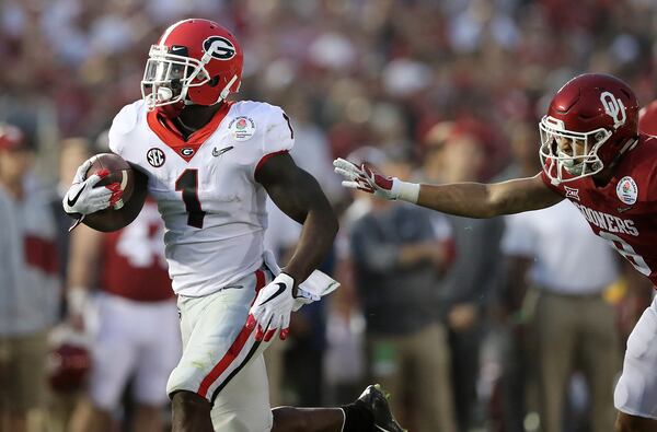 Georgia tailback Sony Michel breaks free for a touchdown against Oklahoma during the second half in the College Football Playoff Semifinal at the Rose Bowl Game. Curtis Compton/ccompton@ajc.com