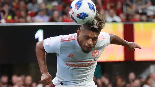 Atlanta United forward Josef Martinez smashes a header against Columbus Crew Sunday, Aug. 19, 2018, in Atlanta.