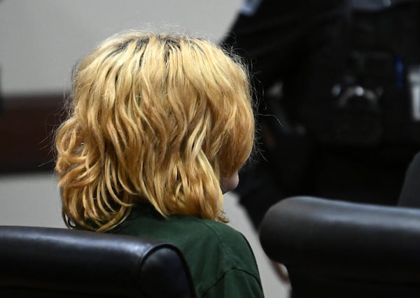 Colt Gray sits during his first appearance before Barrow County Superior Court Judge Currie Mingledorff at Barrow County Courthouse Superior Court, Friday, September 6, 2024, in Winder. The 14-year-old accused of fatally shooting two teachers and two students this week at Apalachee High School and his father made their first appearances in court Friday. Media was restricted from showing Gray's face in court.  (Hyosub Shin / AJC)