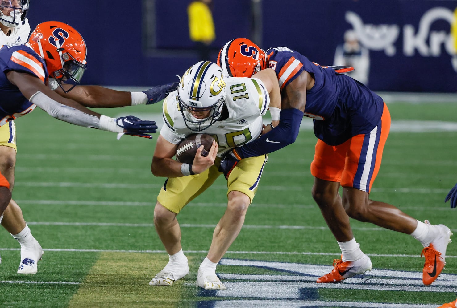 Georgia Tech Yellow Jackets quarterback Haynes King (10) makes a first down on a keeper during the second half of an NCAA college football game between Georgia Tech and Syracuse in Atlanta on Saturday, Nov. 18, 2023.  Georgia Tech won, 31 - 22. (Bob Andres for the Atlanta Journal Constitution)