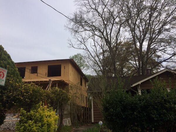 Older homes’ yards usually have lots of trees. Newer homes? Not so much. Photo by Bill Torpy