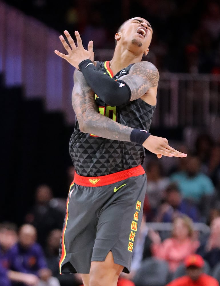 Photos: Hawks defeat the Suns