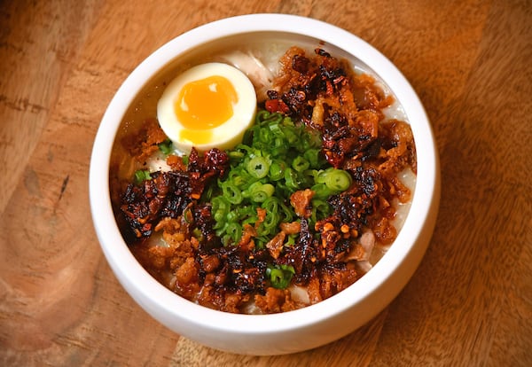 Dakjuk, a savory Korean porridge, has been a comfort food for Spring restaurant chef-owner Brian So since childhood. (CHRIS HUNT FOR THE ATLANTA JOURNAL-CONSTITUTION)