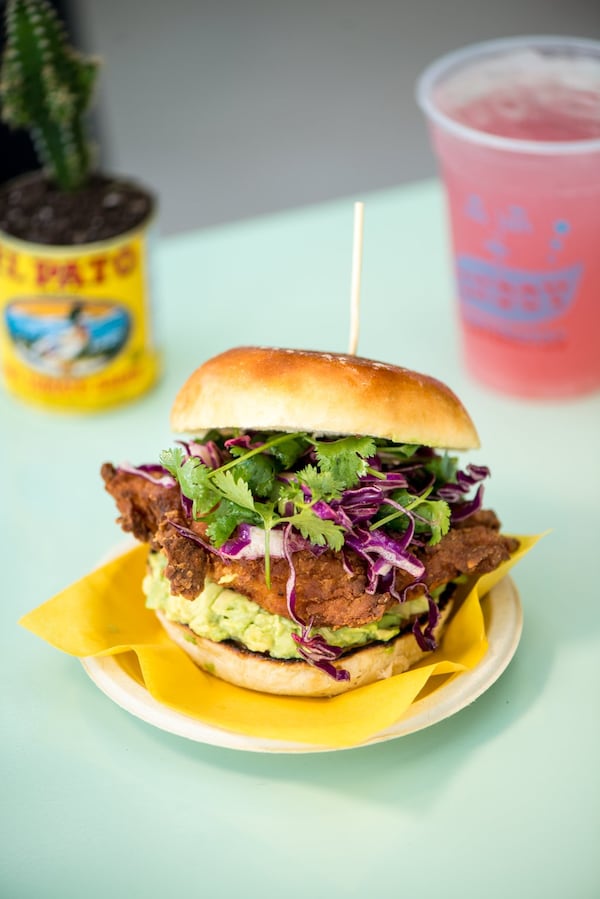 At Little Rey, La Torta dresses up a crispy chicken breast with smashed guacamole, spicy slaw, and pickled jalapeno. CONTRIBUTED BY MIA YAKEL