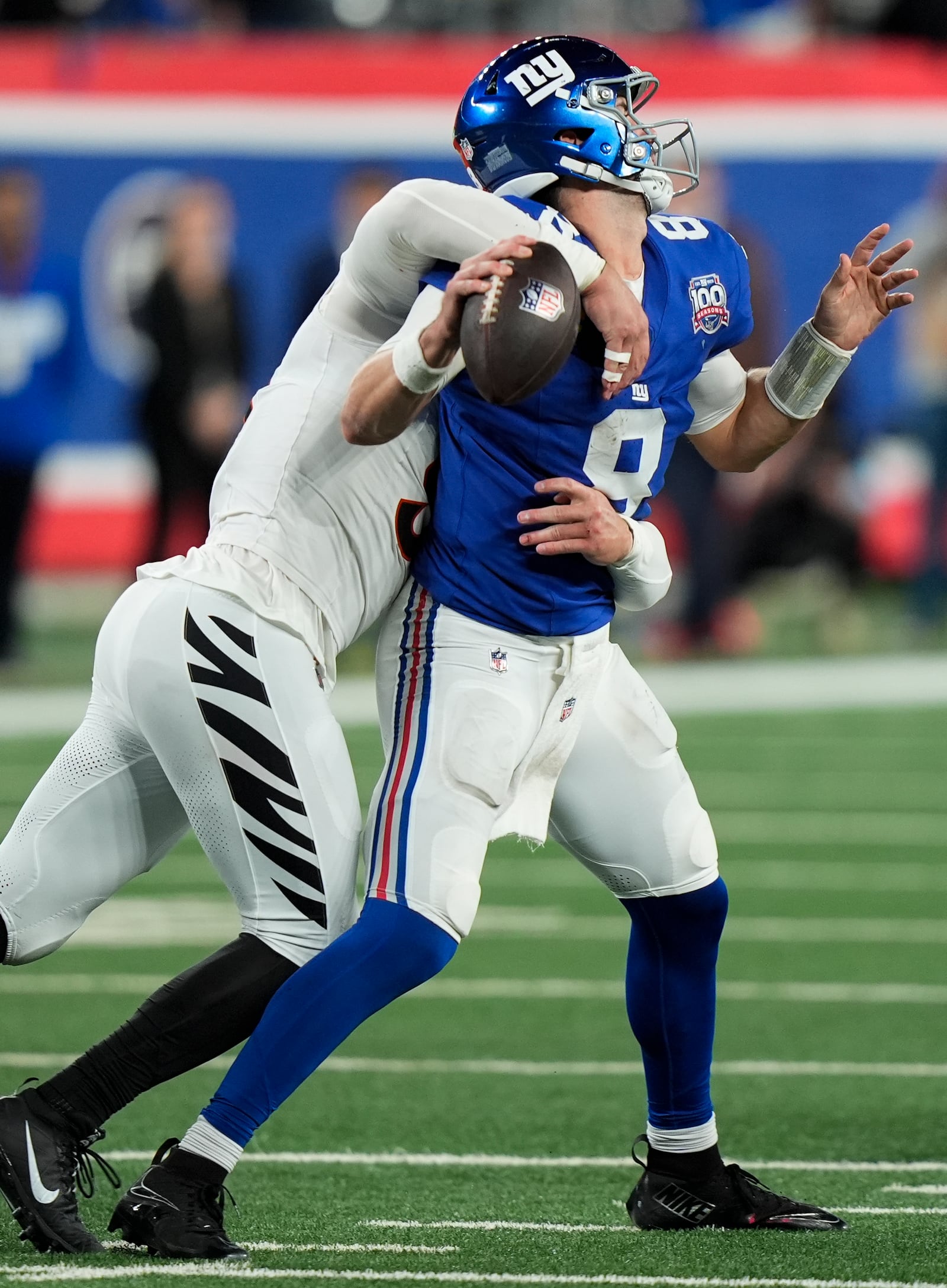 Cincinnati Bengals defensive end Trey Hendrickson (91) sacks New York Giants quarterback Daniel Jones (8) during the second half of an NFL football game, Sunday, Oct. 13, 2024, in East Rutherford, N.J. (AP Photo/Frank Franklin II)