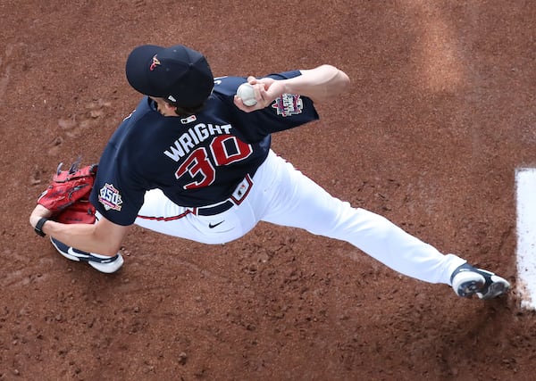 Braves pitcher Kyle Wright loosens up in the bullpen preparing to throw live batting practice during spring training workout Wednesday, Feb. 24, 2021, at CoolToday Park in North Port, Fla. (Curtis Compton / Curtis.Compton@ajc.com)