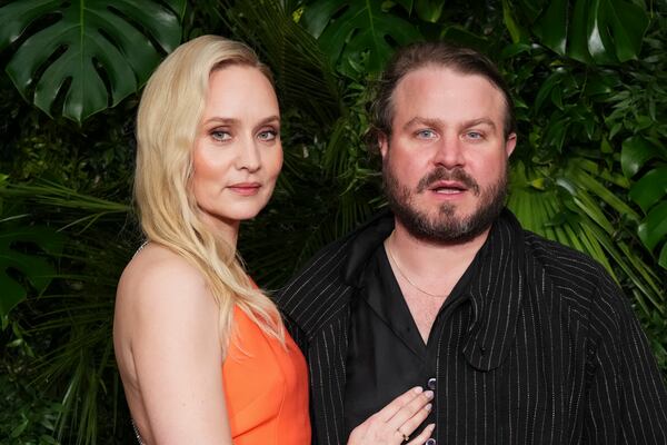 Mona Fastvold, left, and Brady Corbet arrive at Chanel's 16th Annual Pre-Oscar Awards Dinner on Saturday, March 1, 2025, at The Beverly Hills Hotel in Beverly Hills, Calif. (Photo by Jordan Strauss/Invision/AP)