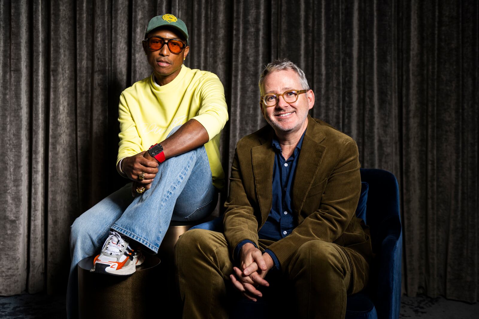 Pharrell Williams, left, and Director Morgan Neville pose for a portrait to promote the film "Piece by Piece" during the Toronto International Film Festival, Monday, Sept. 9, 2024, in Toronto. (Photo by Arthur Mola/Invision/AP)