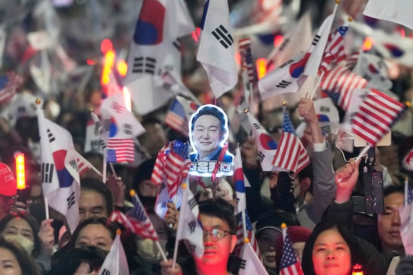 Supporters of impeached South Korean President Yoon Suk Yeol stage a rally to oppose his impeachment near the presidential residence in Seoul, South Korea, Saturday, March 8, 2025. (AP Photo/Ahn Young-joon)